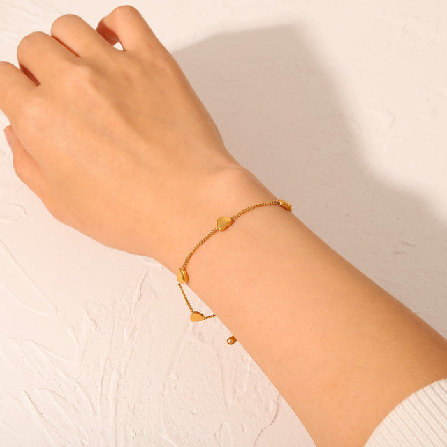 18K Gold Plated Stainless Steel Geometric Thin Bracelet for Women with Four Heart Charms Fashion Jewelry for Travel Souvenirs