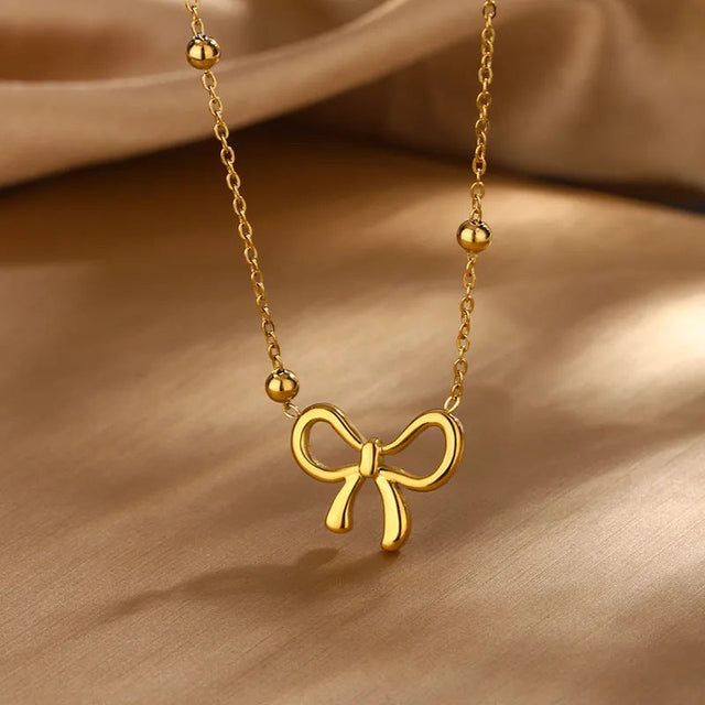 Elegant 18K Gold Plated Stainless Steel Bow Knot Necklace and Earring Set for Women