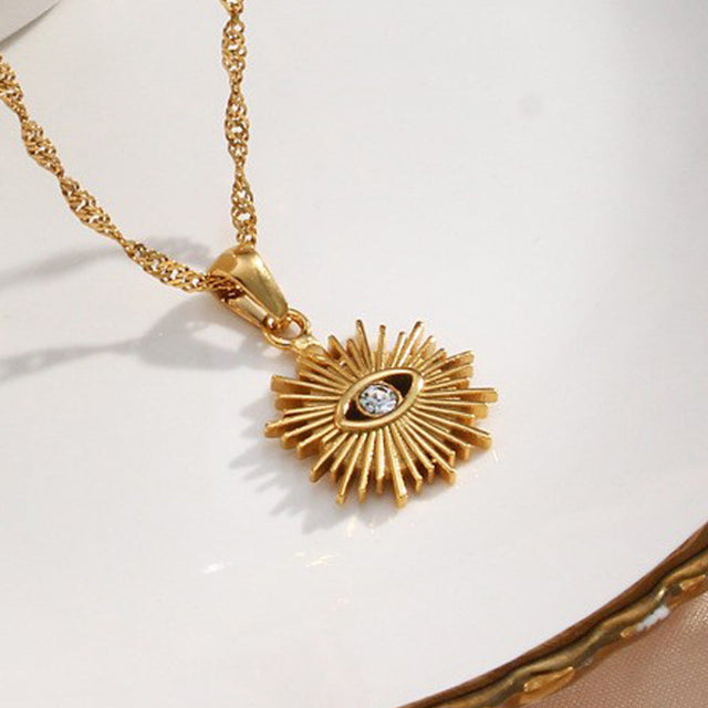 Fashionable Evil Eye Pendant Necklace in Stainless Steel with Hollow Radiant Rhinestone Inlay and Wavy Chain for Women