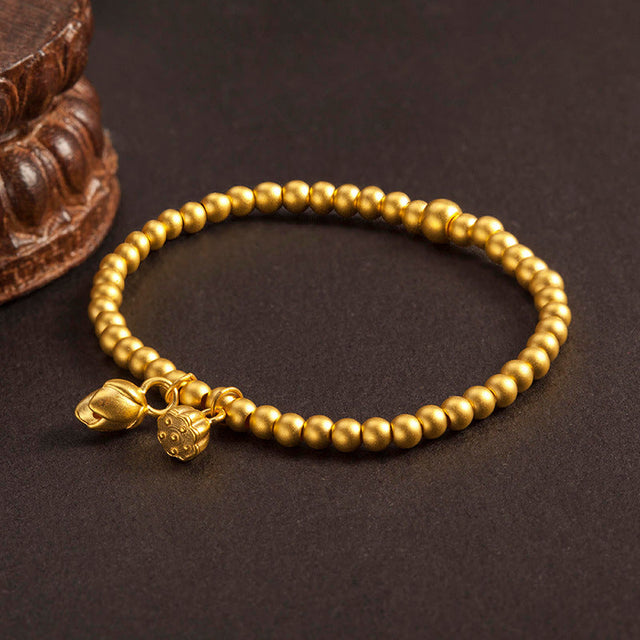 Light Luxury Geometric Lotus Pod and Lotus Flower Beaded Bracelet in Gold and Silver Tone Metal with Elastic Cord