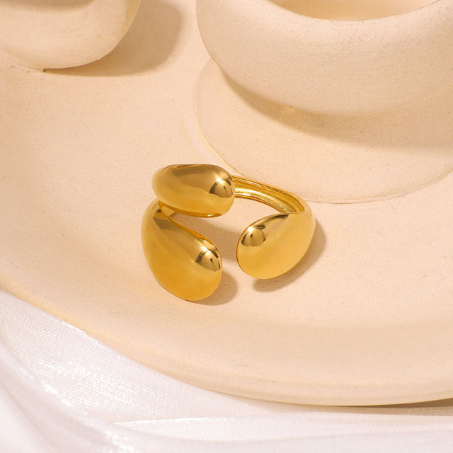 Asymmetrical Oval Geometric Hollow-Out Engraved Stainless Steel Gold-Plated Ring with Leaf Motif