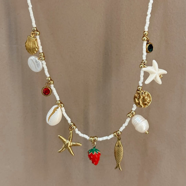 Bohemian Beach Shell Necklace with Starfish and Conch Pendant in Stainless Steel with Plated Finish