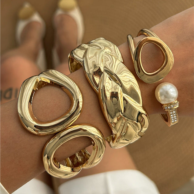 Asymmetrical Hollow Twisted Cuff Bracelet in Alloy with Electroplated Finish for Women