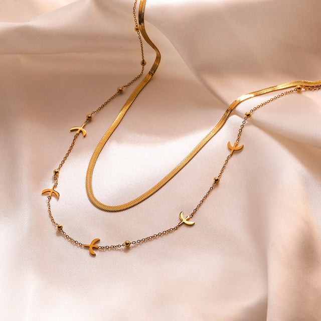 Minimalist Geometric Irregular Four-Leaf Clover Titanium Steel Necklace for Women with Double-Layer Aviation Design