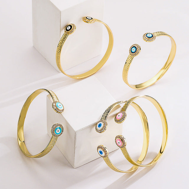 Minimalist Fashion Eye-Shaped Copper Bracelet with 18K Gold Plating and Zircon Inlay for Women