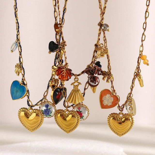 Elegant Handmade Heart-Shaped Stainless Steel Pendant Necklace with 18K Gold Plating, Cotton Rope Chain and Floral Accent